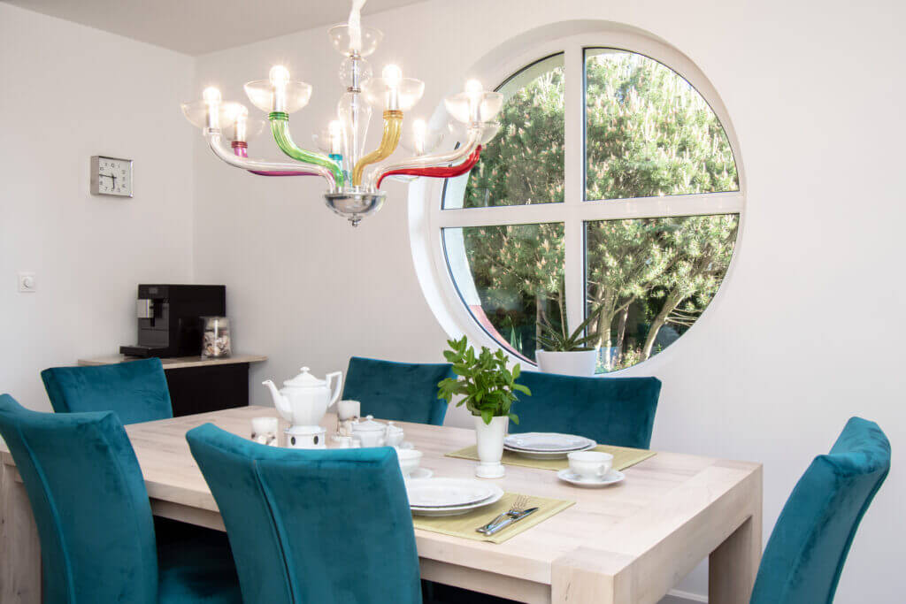 Round window in the dining room.