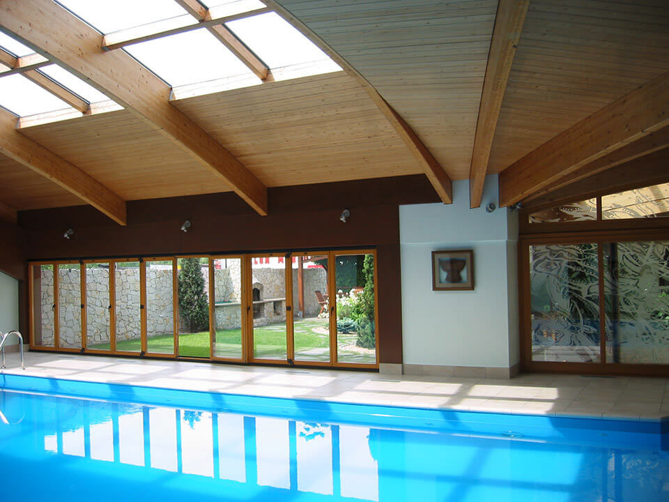 Interior with wood-aluminium lift and slide door.